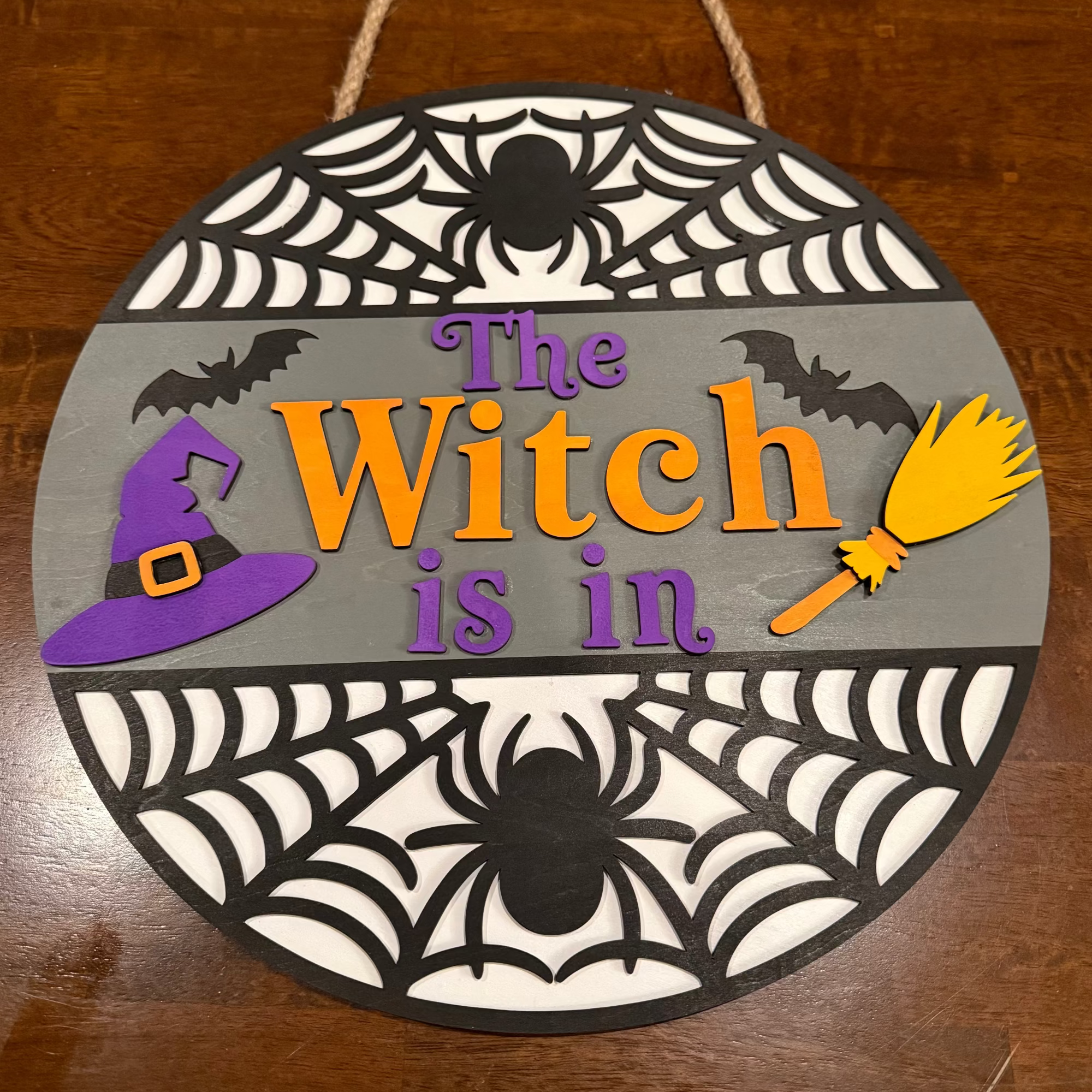 The Witch Is In Door Hanger